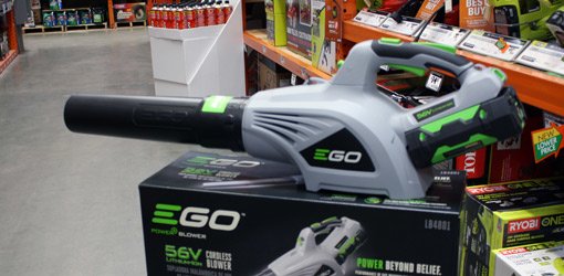 EGO POWER+ cordless leaf blower sitting on top of box in Home Depot store.