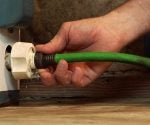 Attaching hose to hot water heater drain