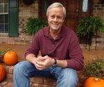 Danny Lipford on front porch of house with pumpkins.