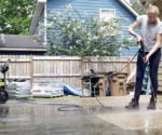 Chelsea pressure washes the patio