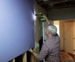 Danny Lipford installing drywall
